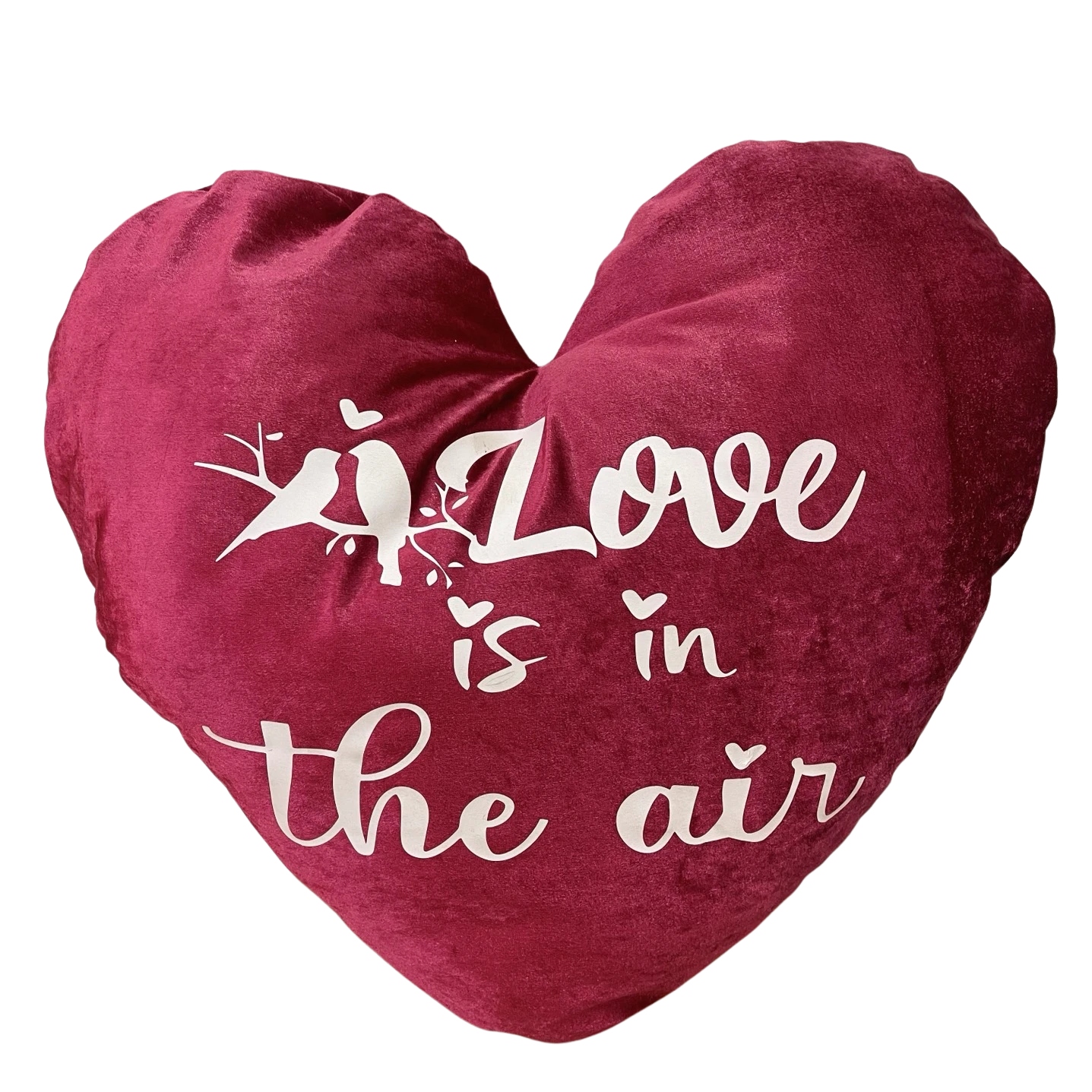 Coussin coeur en velours.